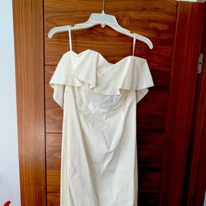 Bardot white dress. Below the knees.